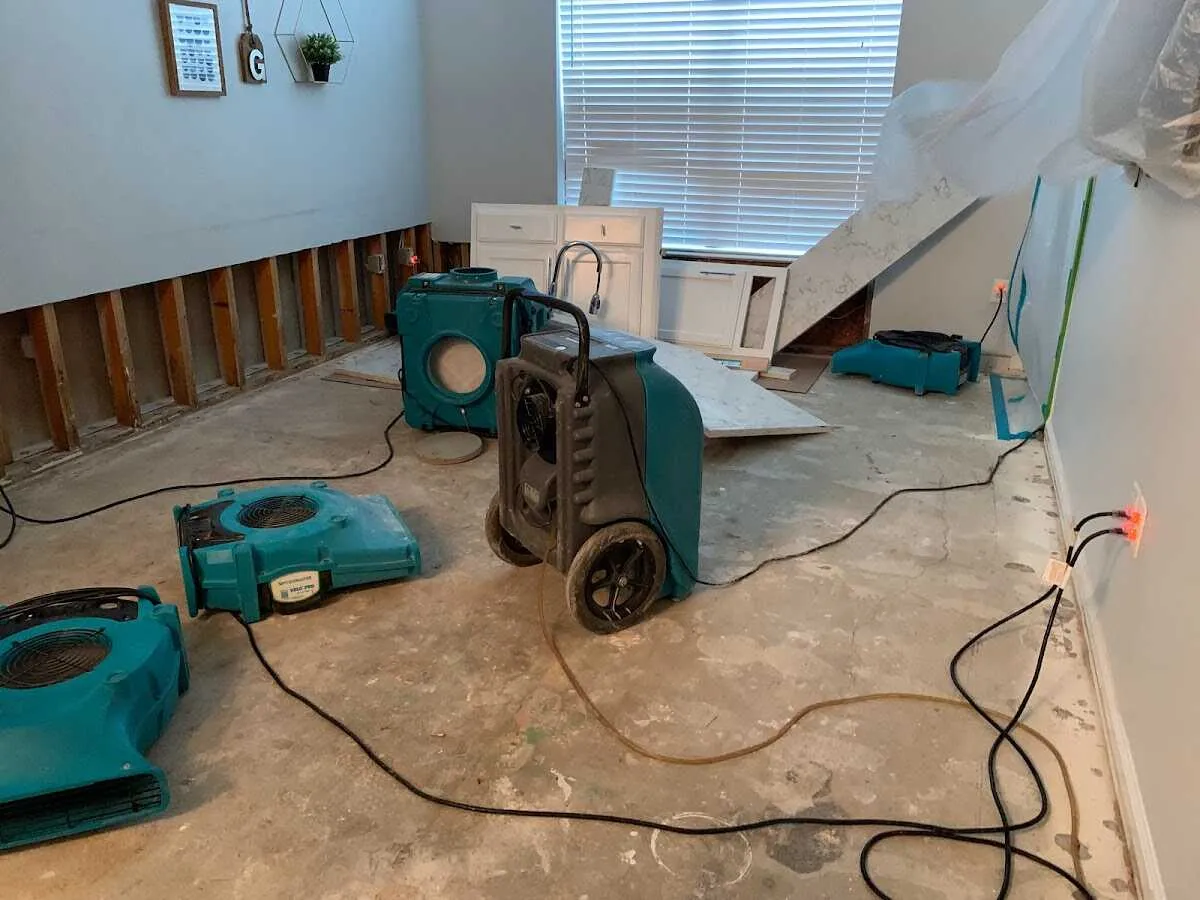 Dehumidifier in flood-cut room for Water Damage Restoration in Forest Glen